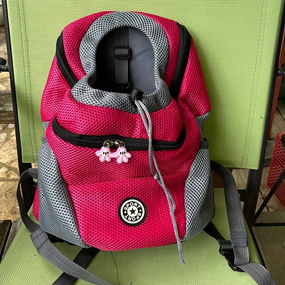 Dog Backpack Pink 12x13 Website says fits 0 to 10 lbs. See attached picture